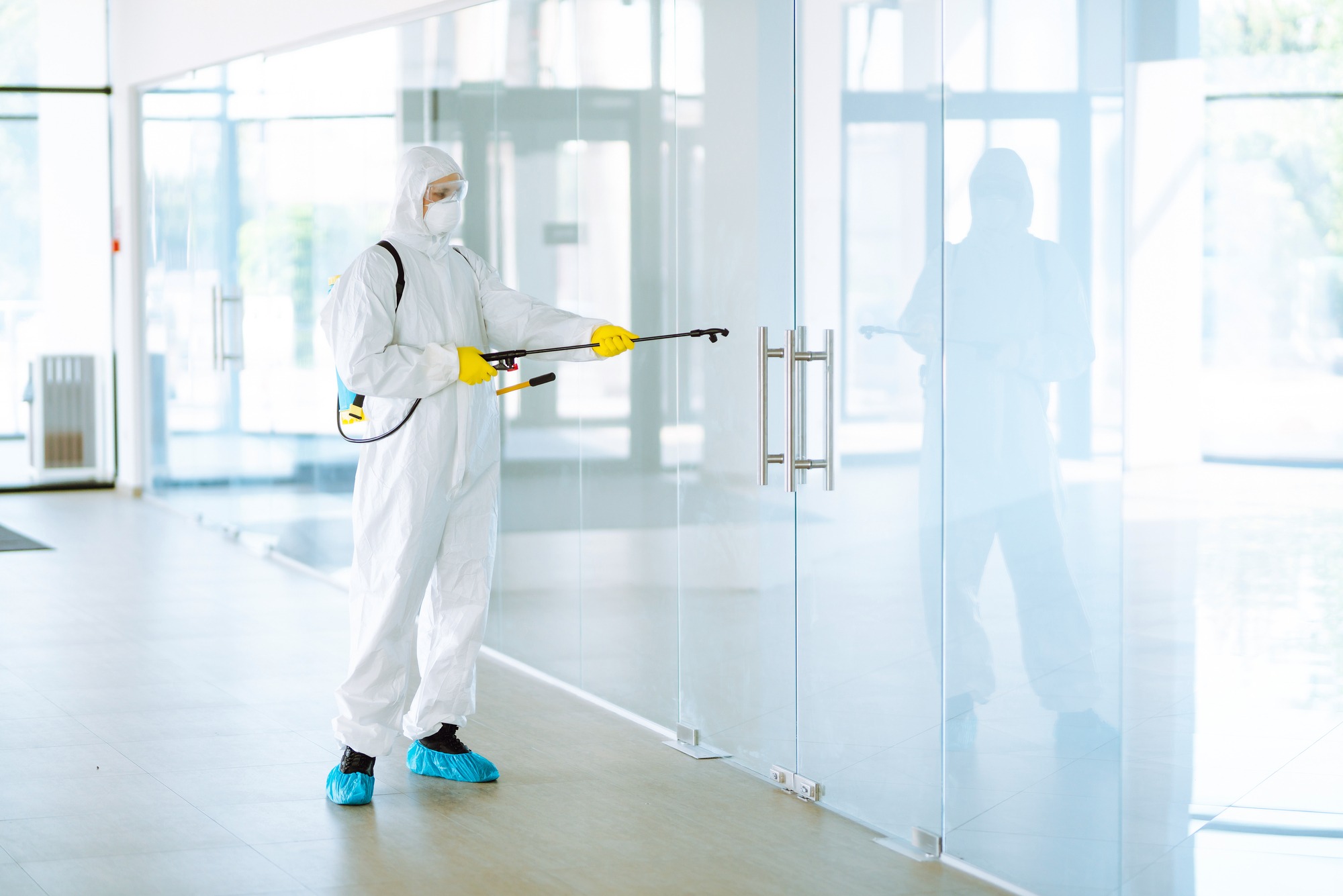 Disinfecting and cleaning a cleanroom